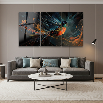 Hummingbird glass wall art triptych hanging in a luxury living room with warm grey walls, grey sofa and marble coffee table