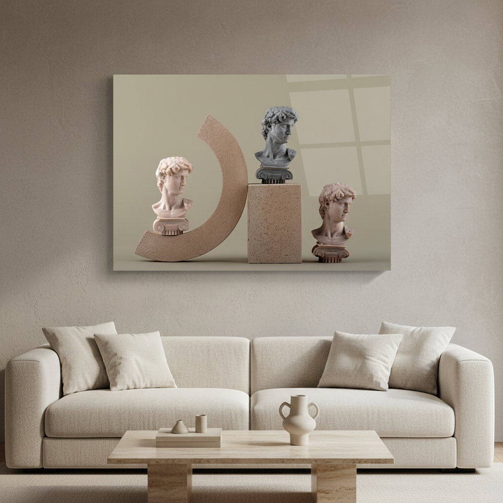 Classical Busts Glass Wall Art above a cream sofa in a soft minimalist living room