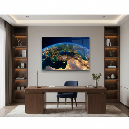 Earth at night glass wall art displayed in a luxury home office