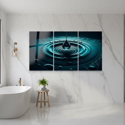 Teal water drop triptych glass wall art in a luxury bathroom with white marble walls